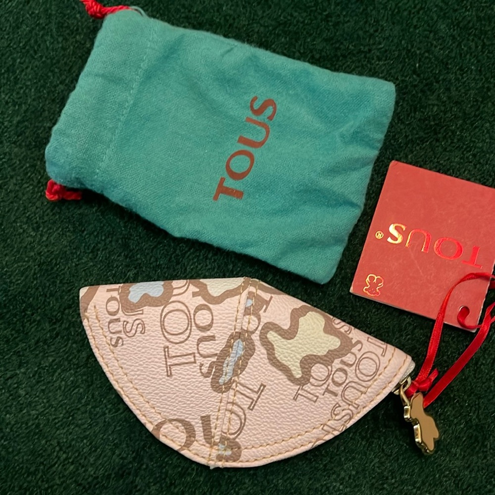 Tous coin purse 6x3-1/4” never used. With tags.